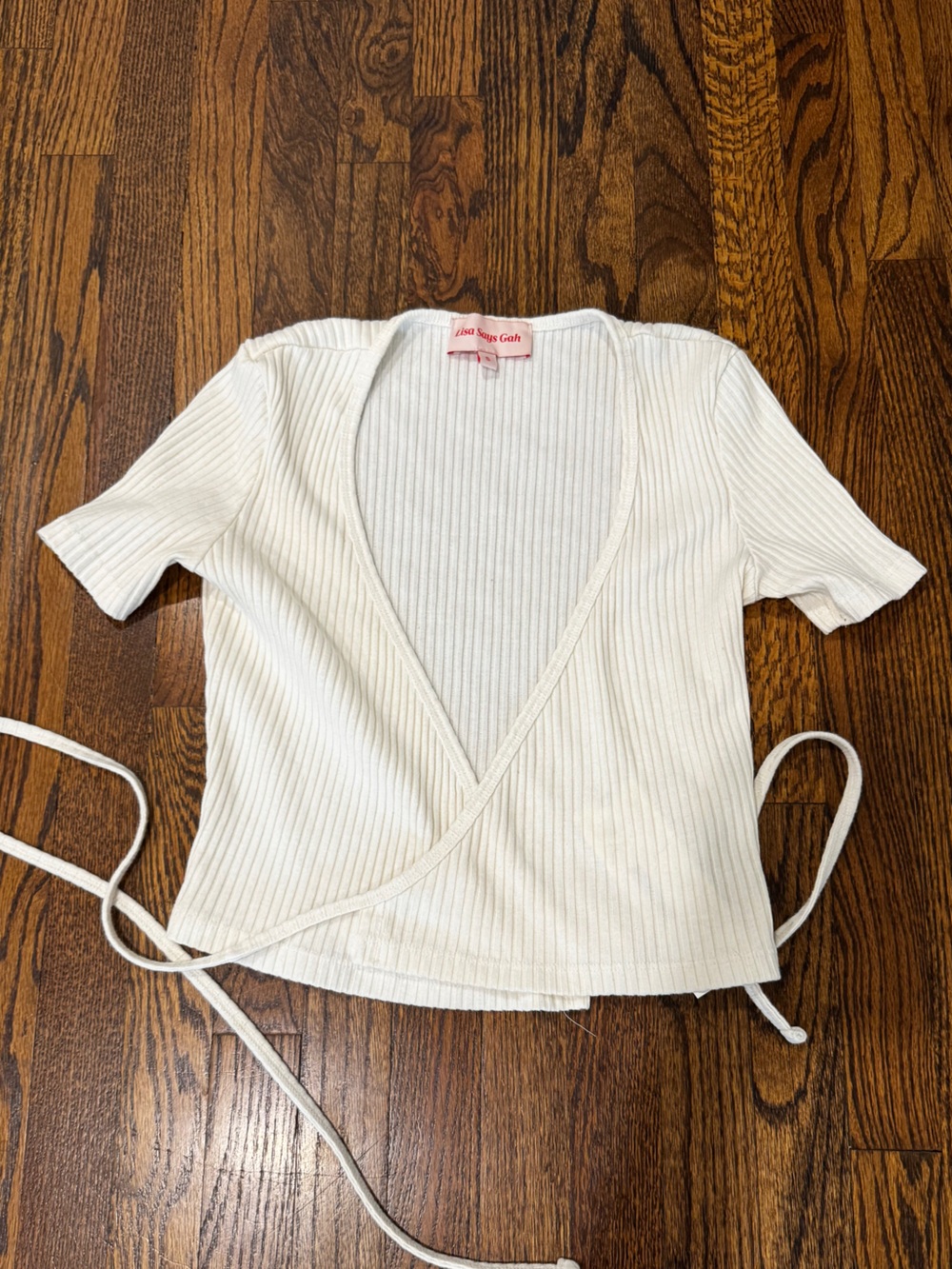 Lisa Says Gah Ivory Wrap Top